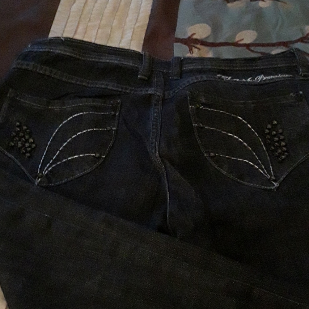 Jeans with embellished pockets